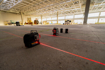 Rotary measuring construction laser levelling on construction site close up