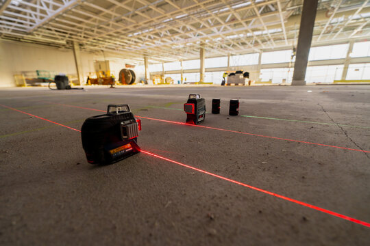 Rotary measuring construction laser on construction site close up