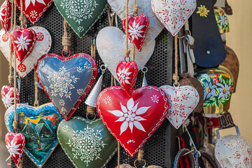 Hanging decorated metal hearts