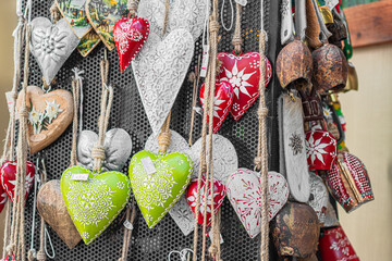 Hanging decorated metal hearts