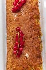 Plum cake with red currants