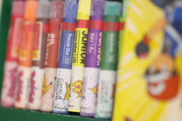 close up of pack of crayons and color pencils