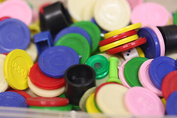 pegs and play coins meant for games like business, Chinese checkers, uno etc.,