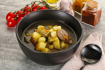 Soup with meatball and potato