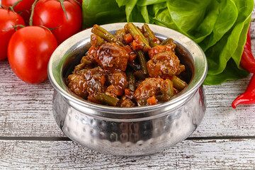 Meatball with vegetables and spices