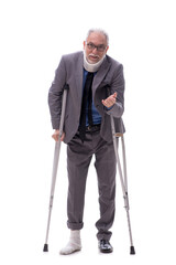 Old businessman after car accident isolated on white