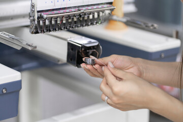 fixing and adjusting sewing threads on the industrial  sewing machine
