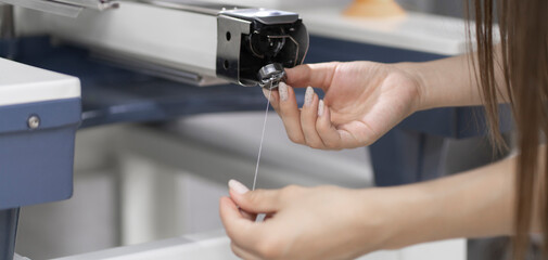 fixing and adjusting sewing threads on the industrial  sewing machine