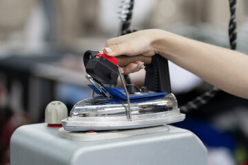 professional industrial iron on the sewing factory