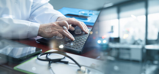 Doctor works over the Internet with a database and cloud computing.