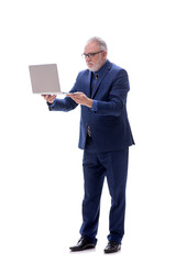 Old businessman holding laptop isolated on white