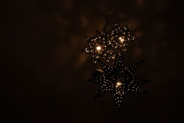 Star lamp craft lit, with star reflections
