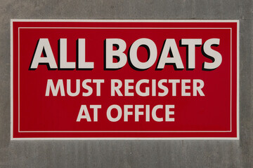 Obraz premium Red and white sign that states 