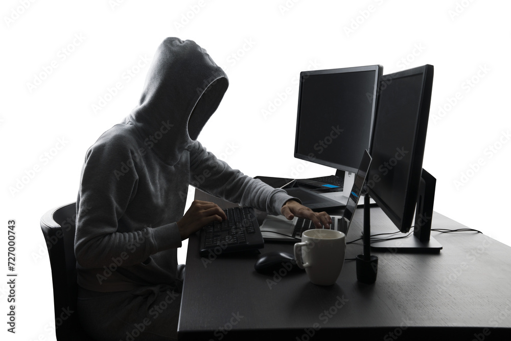 Poster anonymous figure in hoodie at computer workstation, cybersecurity and anonymity concept