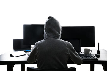 Back view of a person in a hoodie working with multiple monitors, cybersecurity concept