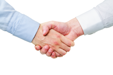 Two businessmen engaging in a handshake, symbolizing deal and agreement