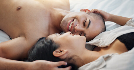 Happy couple, talking in bed with love, intimacy and romance at home for relationship, sex and...
