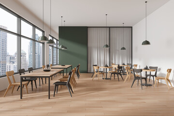 Modern cafe interior with chairs and tables near panoramic window