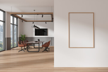 White and gray board room interior with TV and poster