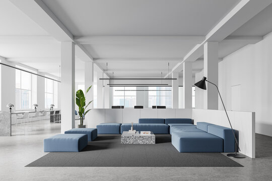 White office waiting room interior with blue couches