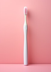 White toothbrush on a pink background. Generative AI.