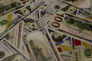 Fototapeta na wymiar Texture US dollars. Background of one hundred dollar bills.