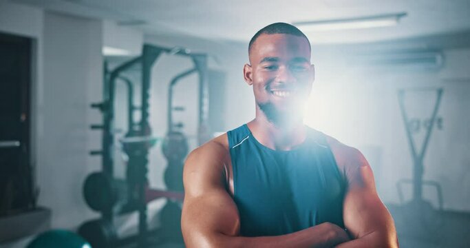 Fitness club, arms crossed and black man happiness for gym, bodybuilding or exercise commitment. Dedication, portrait or male body builder determined for active lifestyle, training or sports activity
