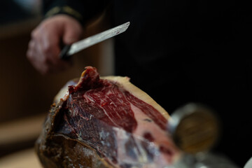 detail of a black leg Iberian ham cutter