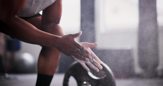 Man, hands and clapping chalk in weightlifting, grip or getting ready for workout, exercise or training, Closeup of active muscular male person or bodybuilder hitting powder for barbell preparation