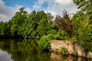 Fototapeta na wymiar Castle moat in Sarthe, France