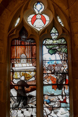 Stained glass depicting French missionary priest Jacques Desire Laval in Holy Trinity church, Pinterville, France