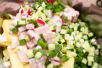 Cold soup Okroshka salad in a saucepan.