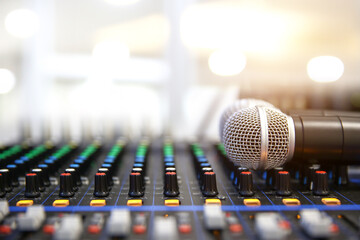 Microphone on sound mixer in live broadcasting studio producer for sound record control system production and audio equipment and music instrument speaker.