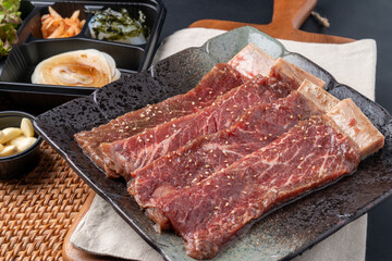 beef, ribs, seasoning, pork, Korean food, grilled meat, grill, side dish, lettuce, onion, garlic, vegetables