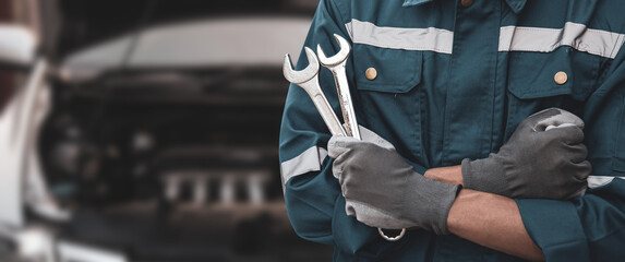 Car care maintenance servicing, Technician auto mechanic using wrench for service and fix car or...