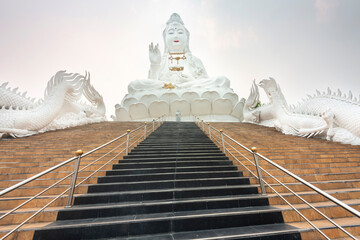 Many steps,leading up to the Big Buddha,Wat Huay Pla Kang temple,Chiang Rai,Northern Thailand. - obrazy, fototapety, plakaty