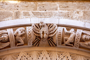 Detail of the tympanum of Santa Maria of the angels chuch, Bari, Italy