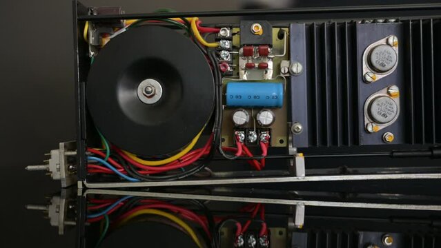 Closeup orbit of a vintage custom amplifier circuit board