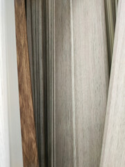 Artistic wooden background from different types of wood. Copy space for text.