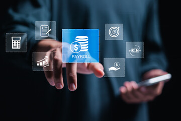 Payroll business finance concept, Businessman touching virtual Payroll icon for report financial...