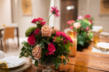 Beautiful tables served for a dinner with flowers and candles. interior decorations, festive, holidays, celebration, restaurant
