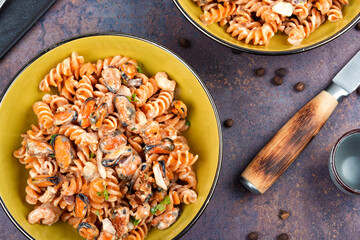 Pasta with mussels and shrimp.