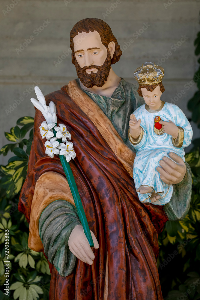 Wall mural statue of saint joseph holding baby jesus, harissa, lebanon