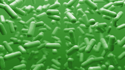 Capsules are moving upward on a green background. Tablet pills capsules float slowly in slow motion. 3d rendering