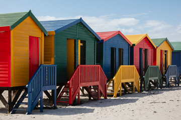 Naklejka premium colorful wooden beach huts at the beach