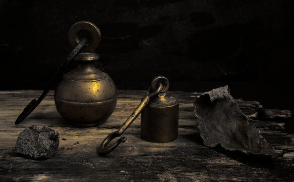 still life with antique brass scale weights