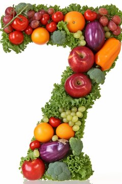 Vibrant number 7 crafted from colorful fruits and vegetables on clean white background