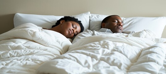 Happy african american couple in white clothing sleeping on white bed with copy space