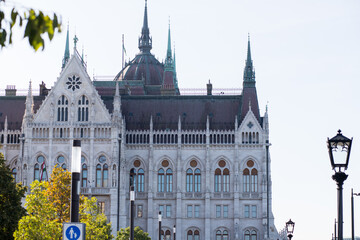 Parliament in Hungary. Triangular roof combined with domes. Gothic style in architecture. Landmark...