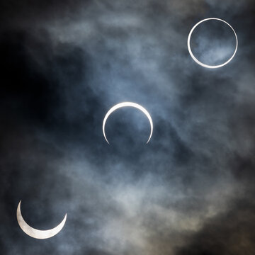Square composite image of three stages of the annular solar eclipse also called the Ring of Fire photographed in San Antonio, Texas in 2023